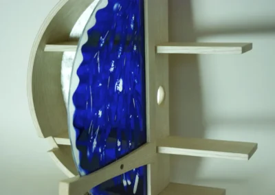 Cabinet with blue door ajar